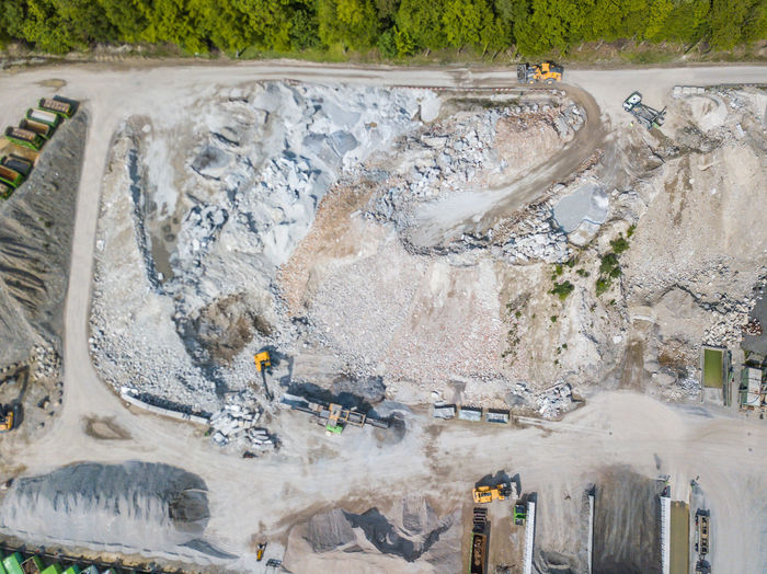 High angle view of earth mover digging land