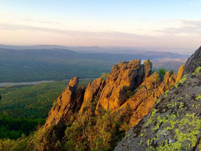 Scenic view of mountain against sky during sunset