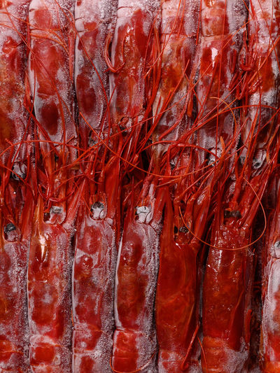 Full frame shot of red chili peppers for sale in market