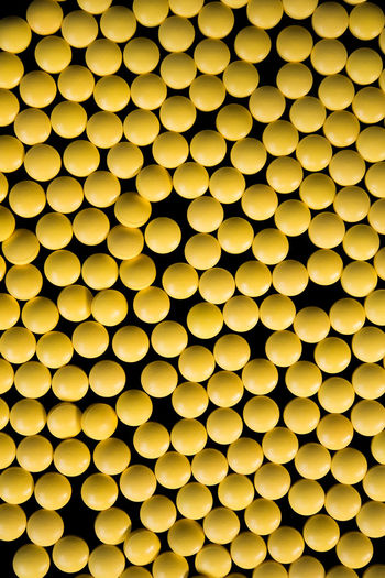 Full frame shot of yellow pills 