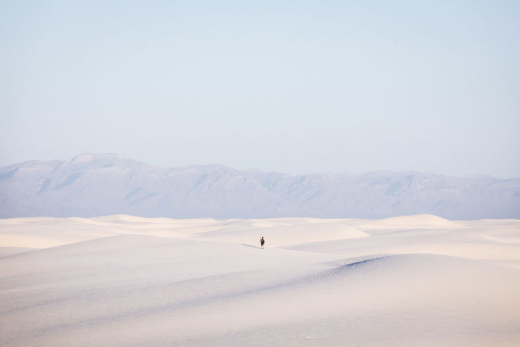A man is taking selfie in white sands national park