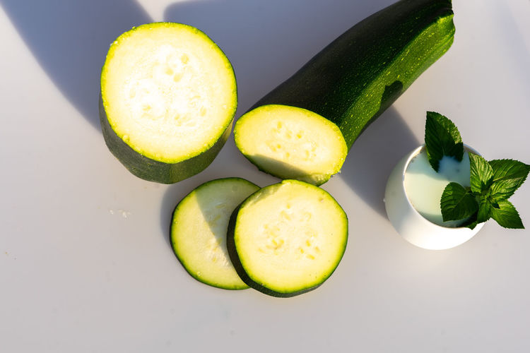 High angle view of cucumber on white background