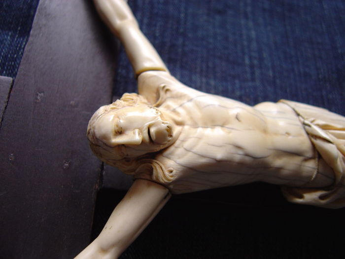 Close up of an antique crucifix, impressive sculpture, christ 