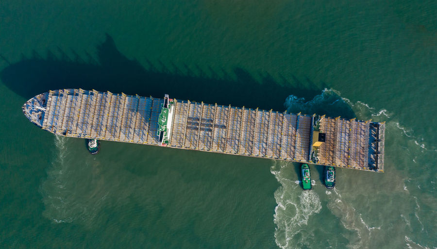 Aerial view of commercial dock in sea