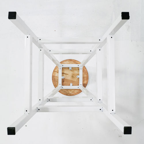 Low angle view of electric lamp hanging on ceiling