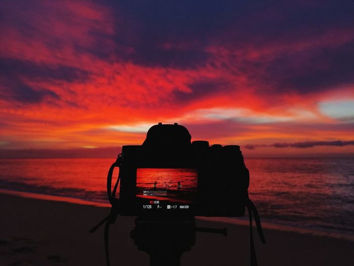 Dawn shore with a camera recording
