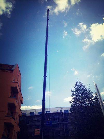 Low angle view of built structure against blue sky