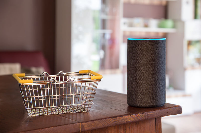 Shopping basket is filled virtually. the smart speaker buys goods from the internet by voice command