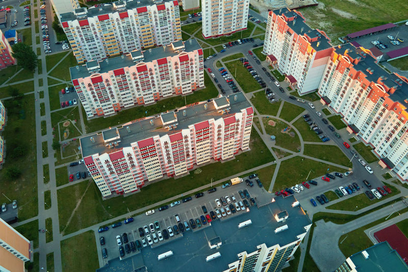 High angle view of people on road along buildings