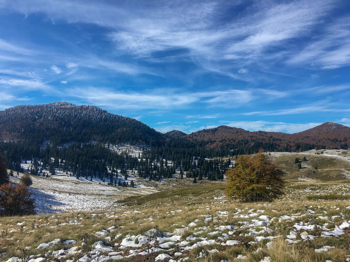 Hiking on a sunny cold winter day in national park velebit, veliki rajinac, croatia