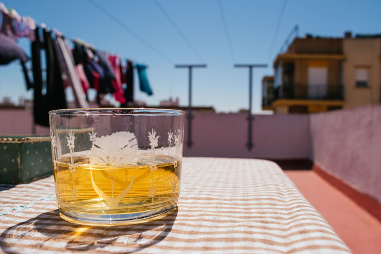 Glass of beer on a table in a terrace in a sunny day