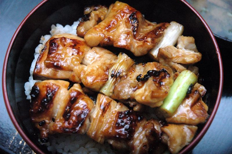 High angle view of chicken yakitori in bowl on table