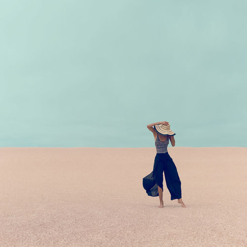Fashion model in the desert on vacation
