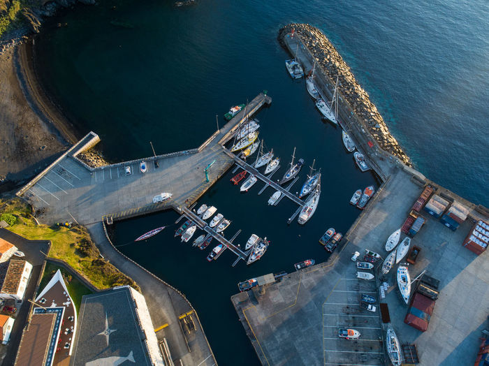 Aerial view of boats moored at harbor