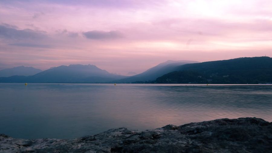 Scenic view of lake against sky during sunset