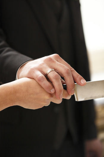 Close-up of couple hands