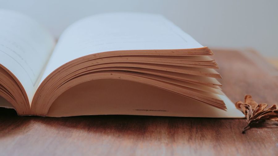 Close-up of open book on table