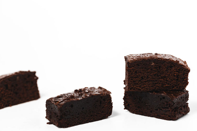 Close-up of chocolate cake against white background