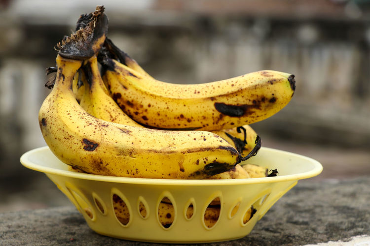 Close-up of yellow bananas on table