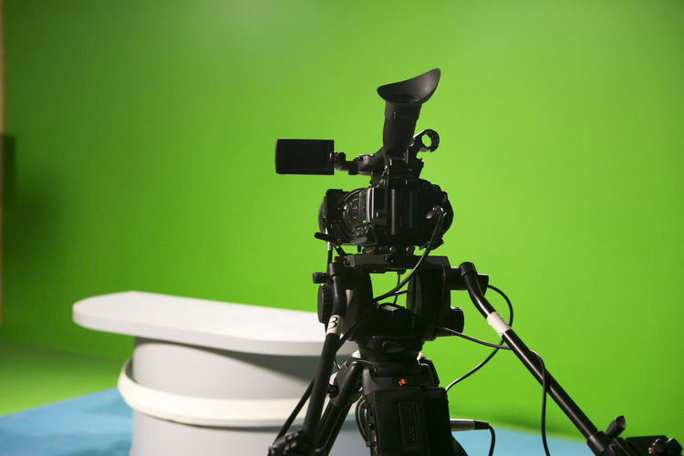 Close-up camera on tripods in film studio