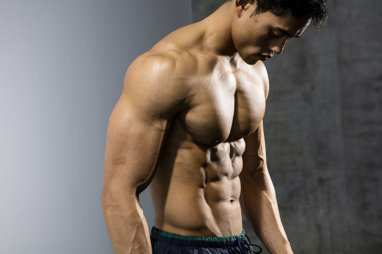 Close-up of shirtless muscular man