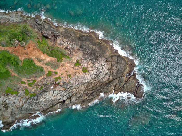 High angle view of rocky beach