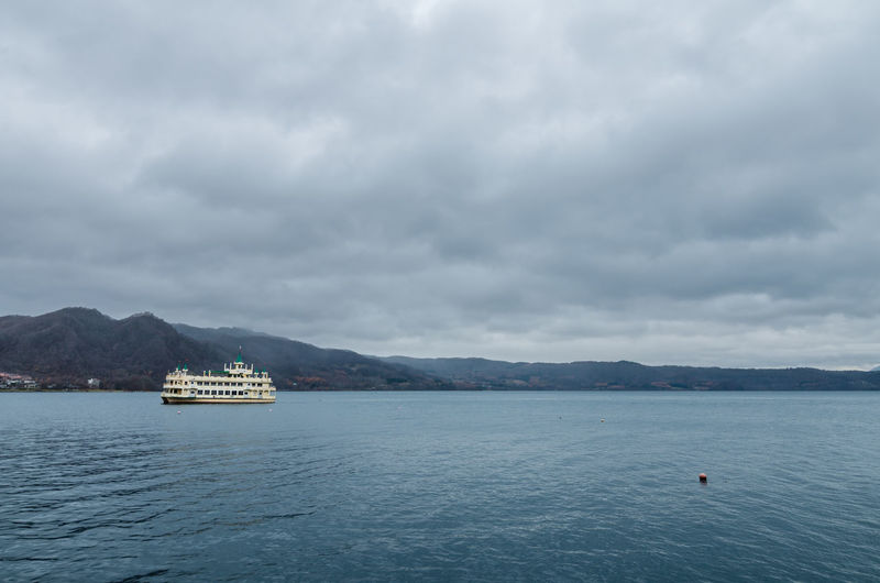 Cloudy view of the infamous lake toya. the lake is a volcanic caldera lake.