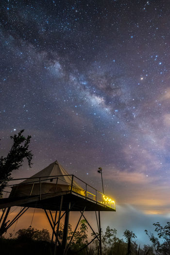 The milky way with camping and sea of mist on thailand