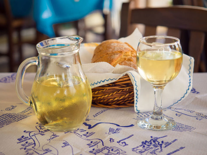 Wine and bread in greek restaurant on lefkada island
