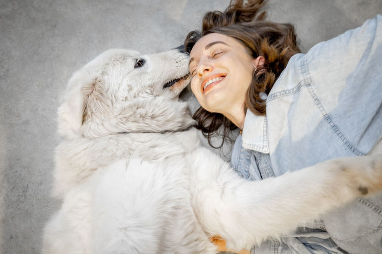 Portrait of smiling woman with dog