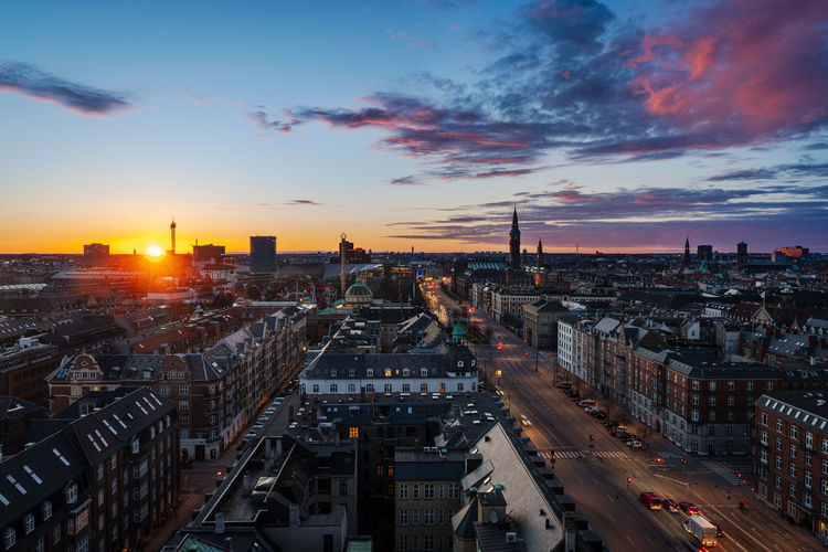 View of the skyline of copenhagen during a sunset