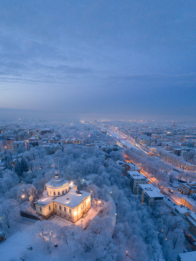 High angle view of illuminated city during winter