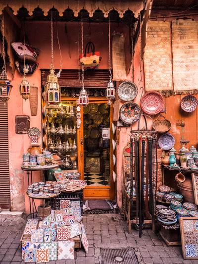 Colorful potteries for sale outside store