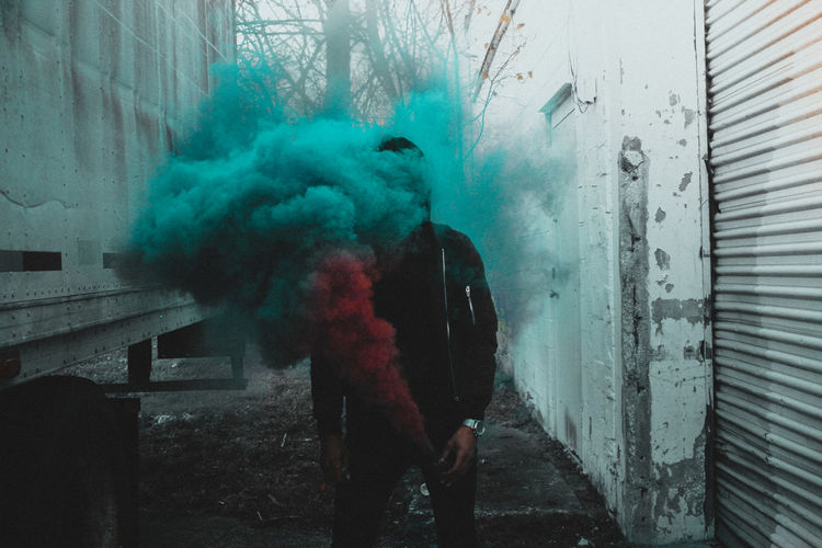 Man holding smoke bomb