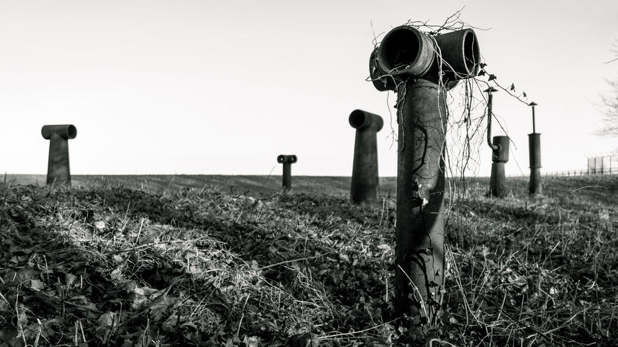 Chimneys of bunkers on field