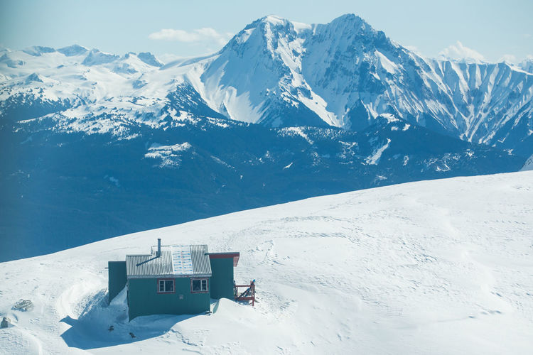 Aerial view of mountain backcountry hut in british columbia