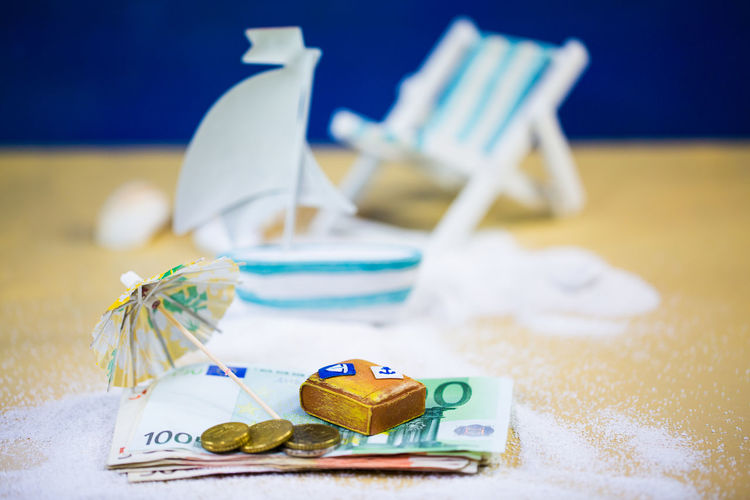 Close-up of paper currency and toys