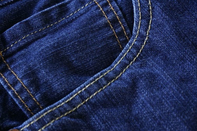 Close up of blue jeans fabric