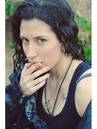 Portrait of young woman looking away
