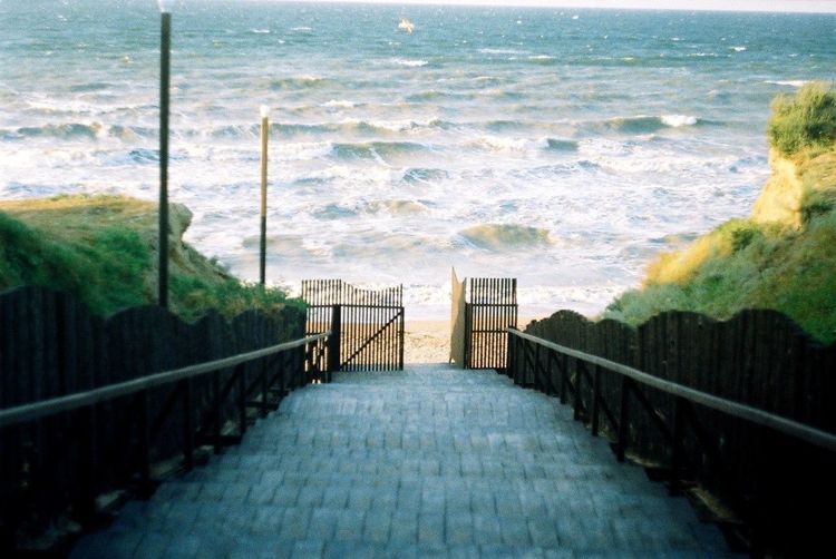 Scenic view of sea at the end of steps