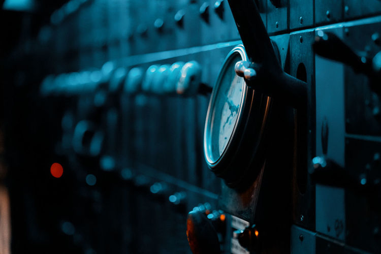 Close-up of illuminated machine part