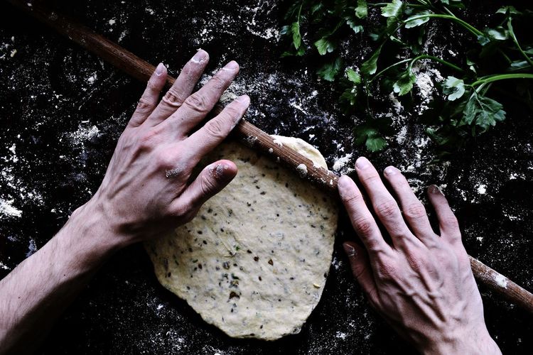 Making 'naan', indian bread with extra spices and herbs. Tabletop Still Life Photography Homemade Food Healthy Food Healthyfood Homemade Bread Still Life Daylight Rustic Style Black Background Homedecor Rustic Flour Breadmaking Bread Pastry Close-up Indoors Food Human Hand Spicey Cookingwithlove Table Setting Healthy Eating Cooking Fresh On Market 2017