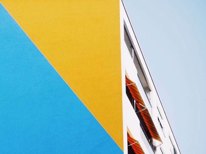 Yellow Low Angle View Blue Outdoors Clear Sky Multi Colored Sky Architecture Building Exterior Minimalism Colorblocking Urban Architecture Geometric Shape Minimalist Architecture Color at Basel, Switzerland The Architect - 2017 EyeEm Awards Paint The Town Yellow