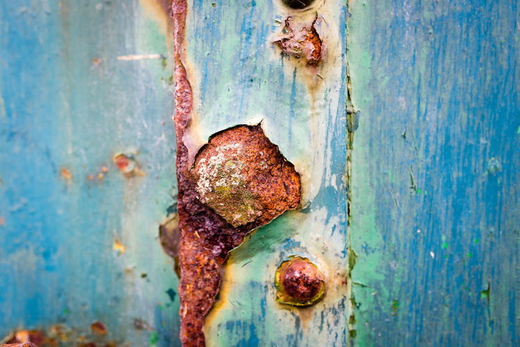 Close-up of old rusty metal door