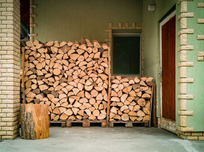 Stack of logs in building