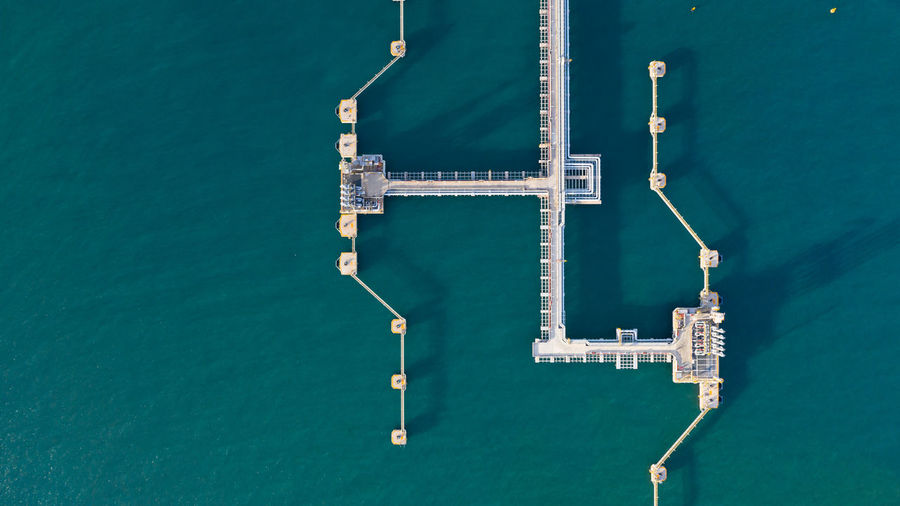 Aerial view of built structures over sea