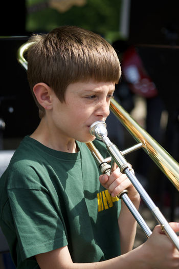 Boy playing trombone