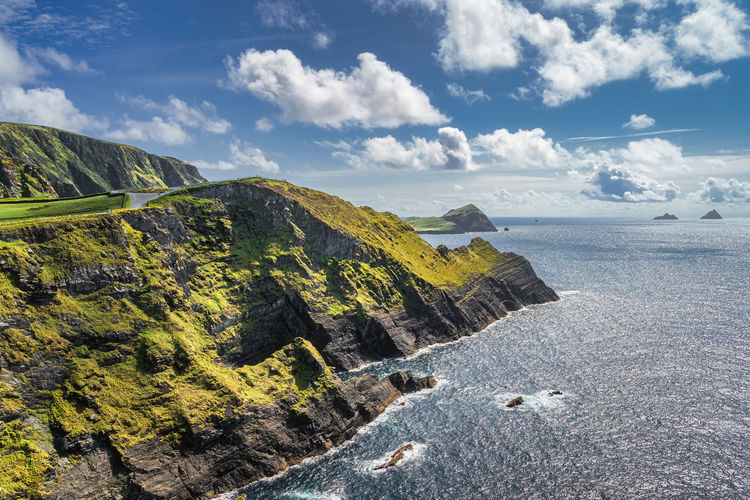 Kerry cliffs in sunlight and a view on skellig michael island. star wars film location, ireland