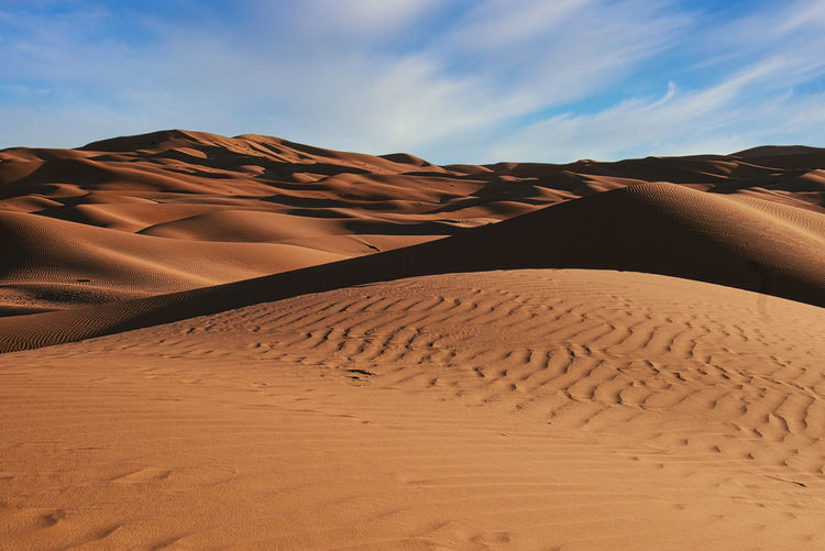 Scenic view of desert against sky