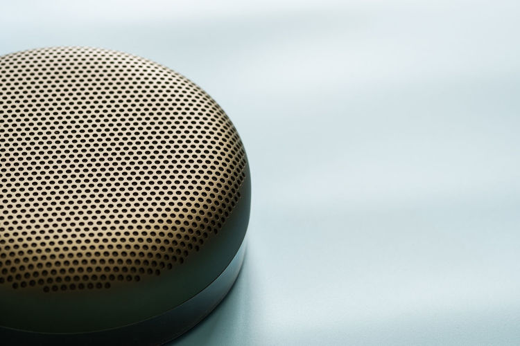 Close-up of bluetooth speaker against white background